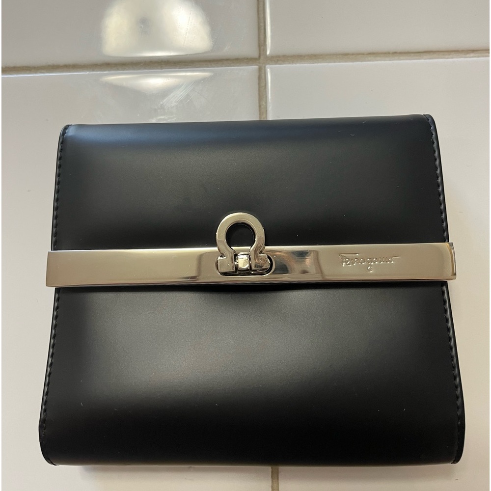 Salvatore Ferragamo wallet. New but cannot find the price tag.